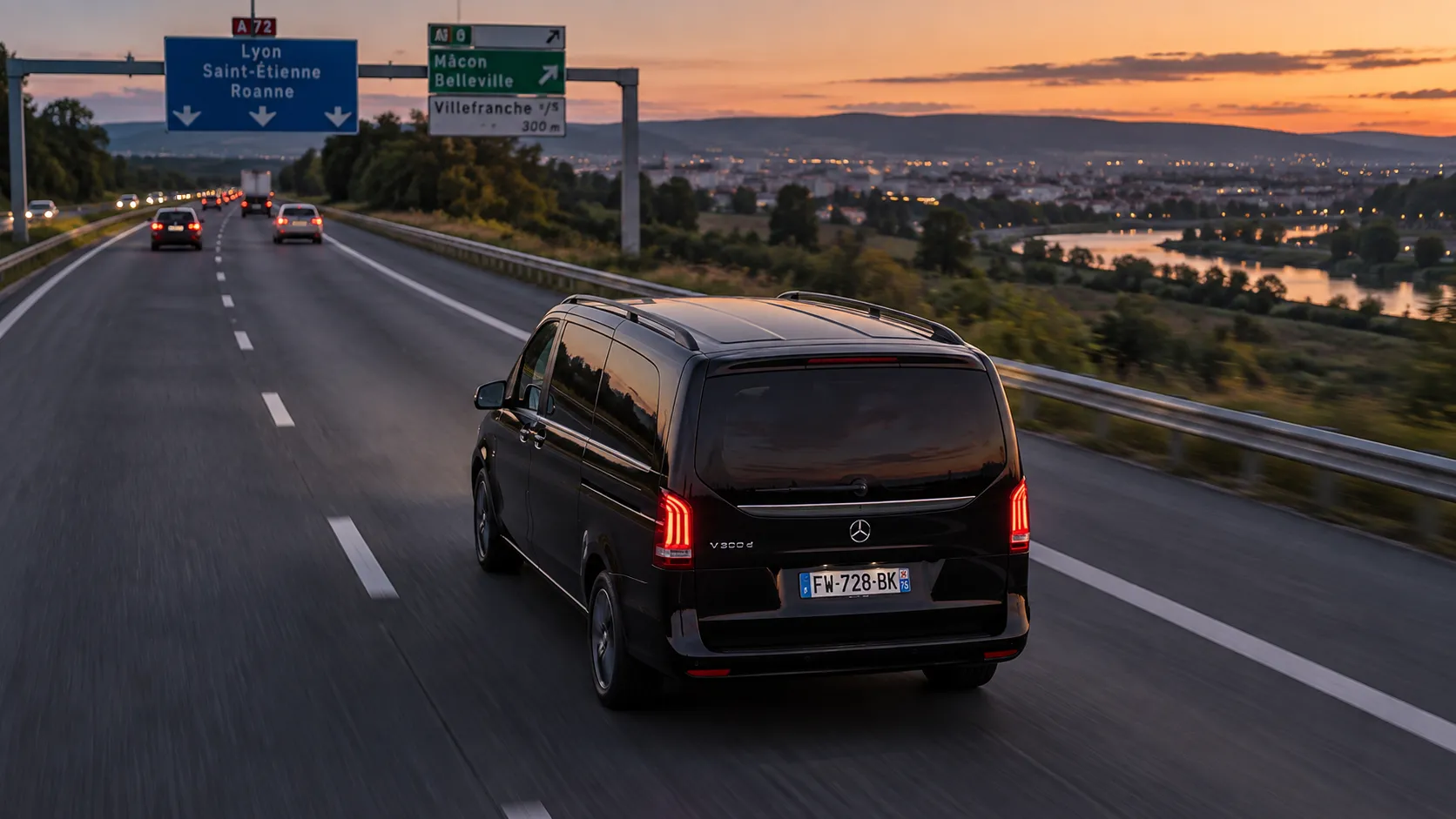 Luxury vehicle on a French motorway at dusk